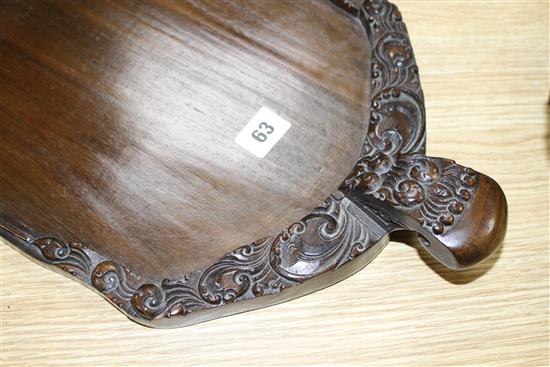 A Burmese carved hardwood tray, 70cm